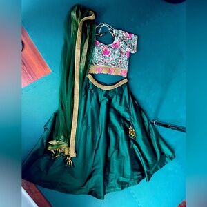 Indian lehenga choli dress for wedding, with matching jewelry